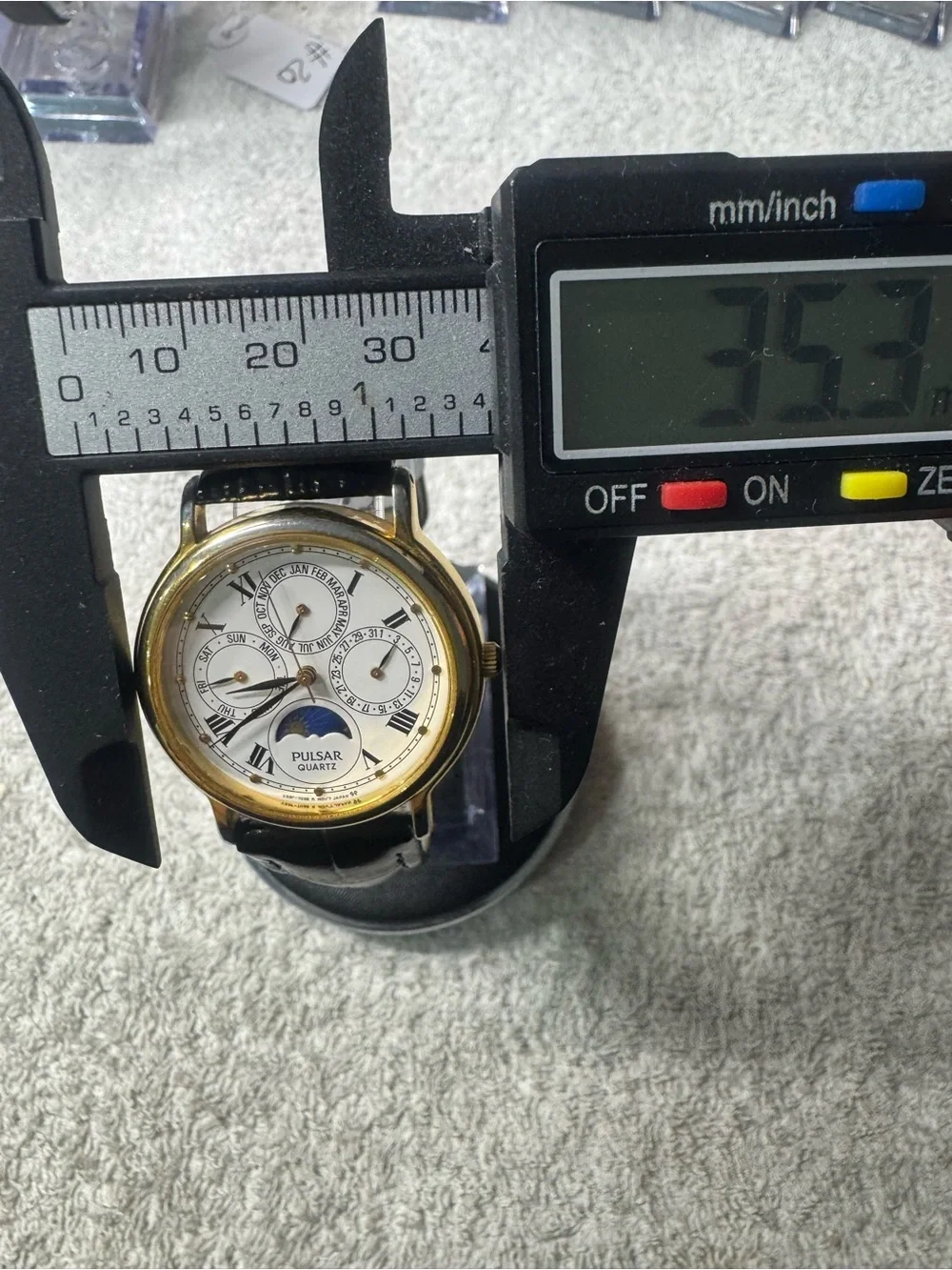 Pulsar Gold-Tone Case White Dial Black Leather Strap Moonphase Watch